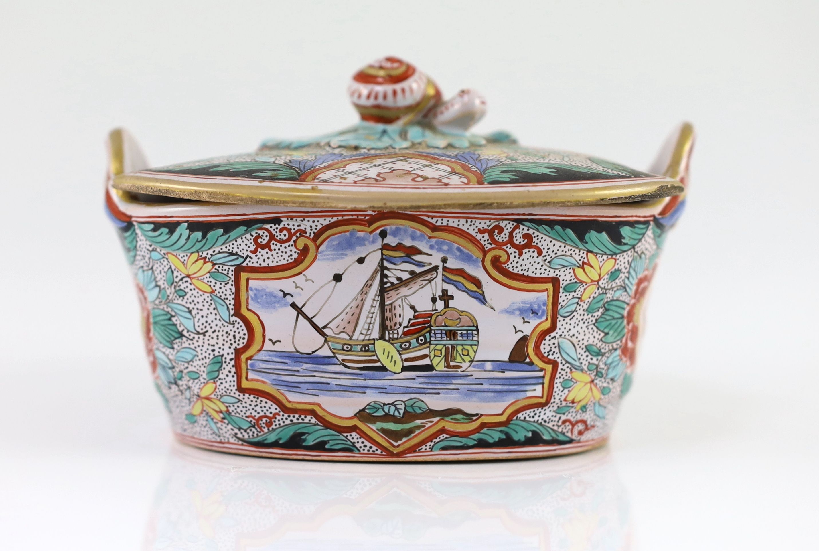 A Delft butter tub, cover and stand, Hendrik van Hoorn manufactory, second half 18th century, 18cm wide, crack to tub